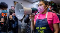 MANHATTAN, NY, UNITED STATES - 2020/11/25: Laundromat workers confront their employer regarding the current working conditions. On the commemoration of the International Day for the Elimination of Violence against Women, a group of seven laundromat workers in New York City, confronted their employer at Wash Supply in Manhattan, alleging abuses of labor law and labor rights. These women have been designated essential workers and their labor makes it possible for people on Manhattans Upper West Side to have their clothes cleaned. (Photo by Erik McGregor/LightRocket via Getty Images)