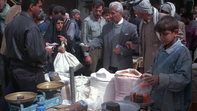 The market in Baghdad, 1997. &quot;Iraq was a good country in terms of food, vegetables and fruits. We ate kosher and had our own butchers&quot; (Photo: AP Photo / John Rice)