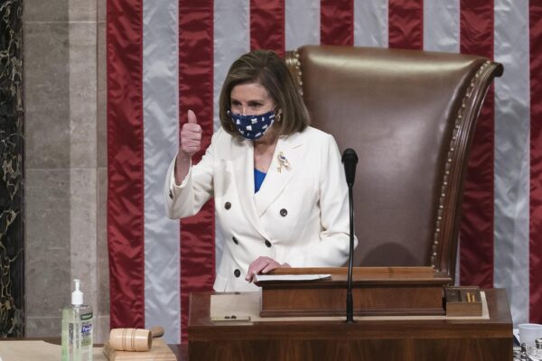 Speaker of the House Nancy Pelosi, D-Calif., gestured after the House approved a landmark $1.9 trillion COVID-19 relief bill, at the Capitol in Washington, Wednesday, March 10, 2021. (AP Photo/J. Scott Applewhite)