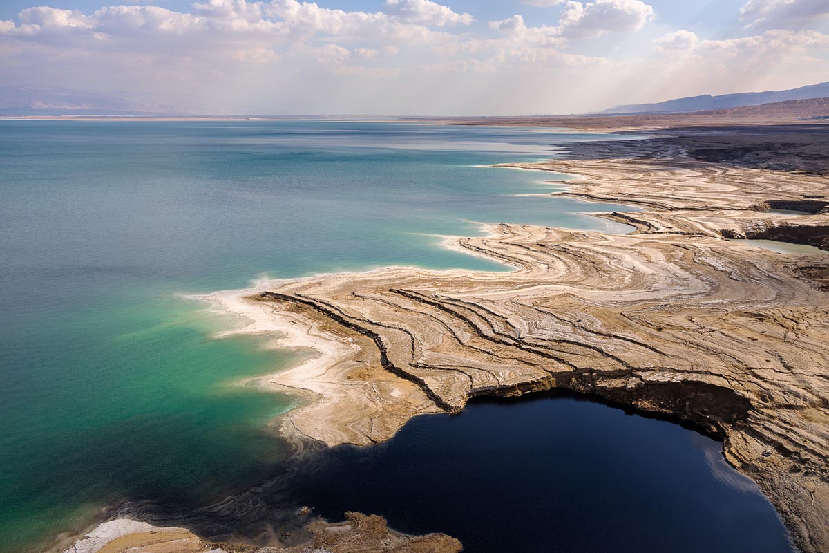 The Dead Sea and its sinkhole. &quot;Within an hour flight, you can see desert and snow views&quot; (Photo: Israel Bardugo)