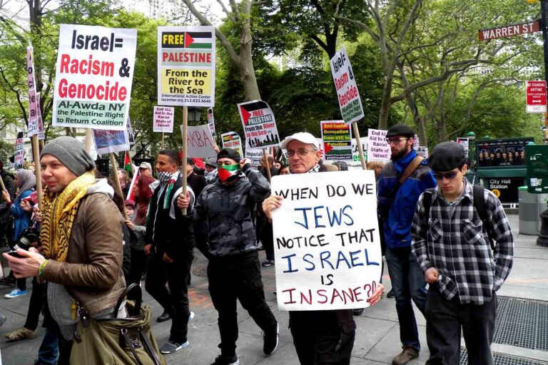A march in New York to mark “Nakba Day” 2015. Middle sign: “when will we Jews notice that Israel is insane?” Top left: “Israel equals racism and genocide” (Photo: Mark Apollo / Pacific Press / LightRocket via Getty Images)