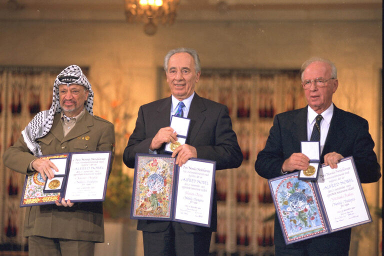 Yitzhak Rabin (right), Shimon Peres (center) and Yasser Arafat (left) at the 1994 Nobel Peace Prize Ceremony (Photo: GPO)
