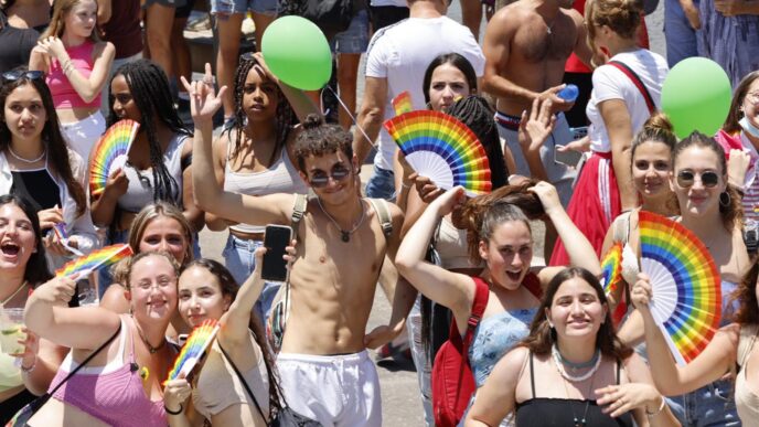Pride attendees in the celebratory atmosphere. (Photo: Guy Yechiel)