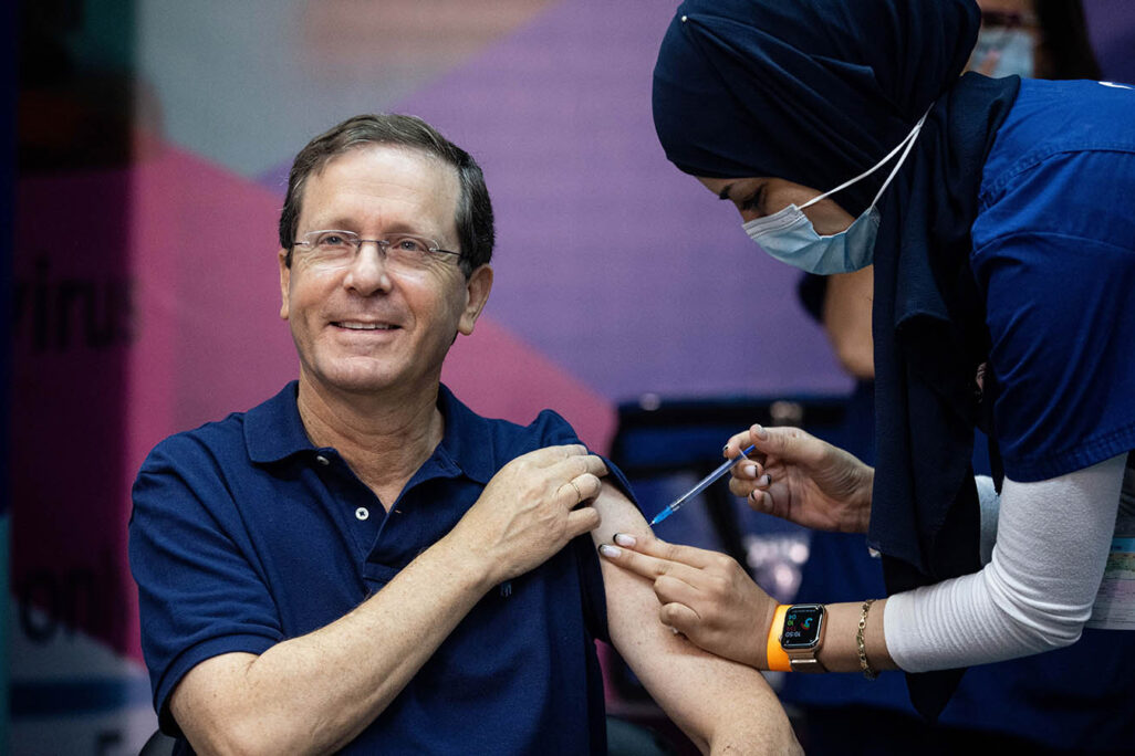 President of Israel Isaac Herzog receives his third vaccine dose. (Photo: Yonatan Sindel/Flash 90)