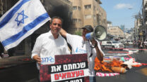 נשיא להב רועי כהן בהפגנת העצמאים (צילום ארכיון: גדעון מרקוביץ)