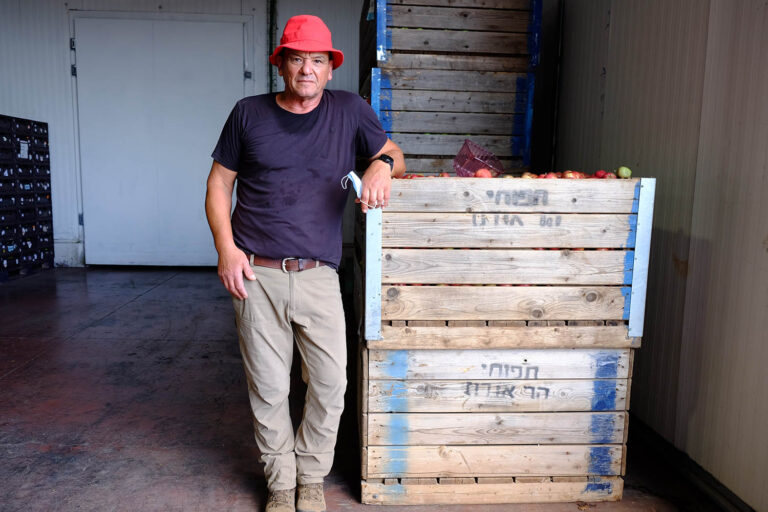 Doron Sassi next to his produce. (Photo: David Tversky)