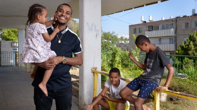 Moshe Falata and his three children. (Photo: Jonathan Bloom)