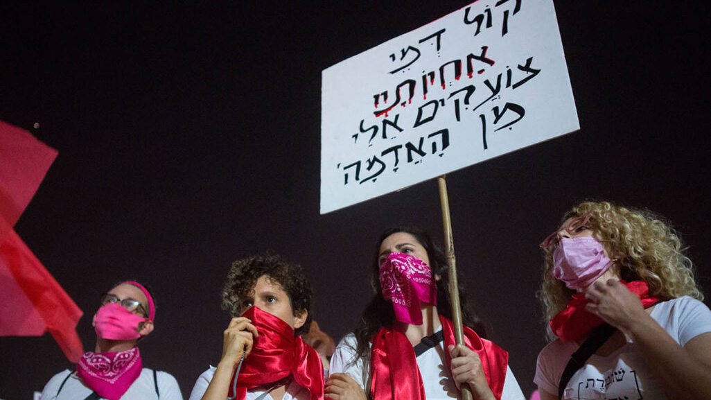 Activists protest against recent cases of violence against women at Habima square in Tel Aviv on October 21, 2020. (Photo: Miriam Alster / Flash90)