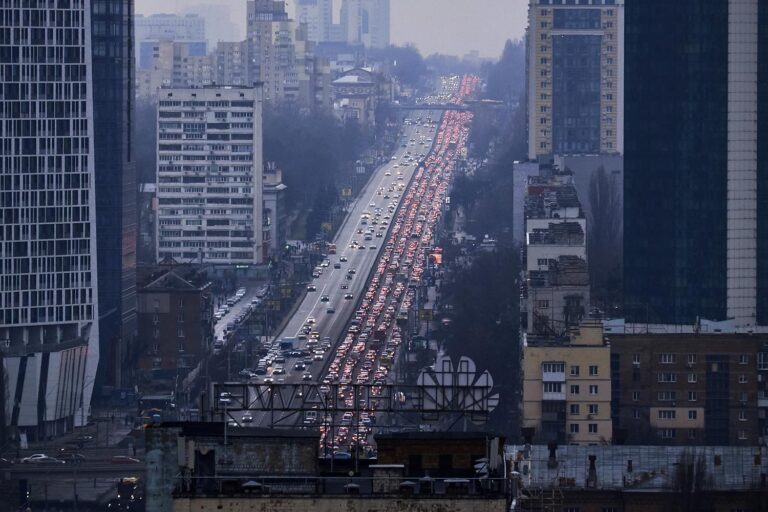 Inhabitants of Kyiv leave the city following pre-offensive missile strikes of the Russian armed forces on February 24, 2022 in Kyiv, Ukraine. (Photo: Pierre Crom/Getty Images)