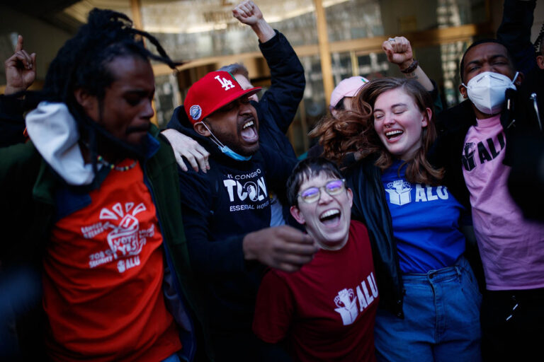 Dutchin (left) celebrates with employees of the Staten Island warehouse after the release of the results of the unionization vote. “It was a life-changing moment for me” (Photo: AP Photo/Eduardo Munoz Alvarez)