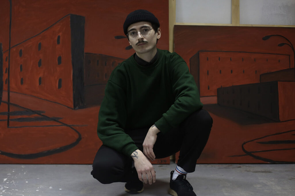 Bohdan Sokur poses next to one of his paintings.(Photo: Anastasia Maximova)