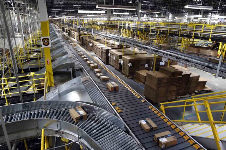 Products on a conveyor belt in an Amazon warehouse (AP Photo/Patrick Semansky)