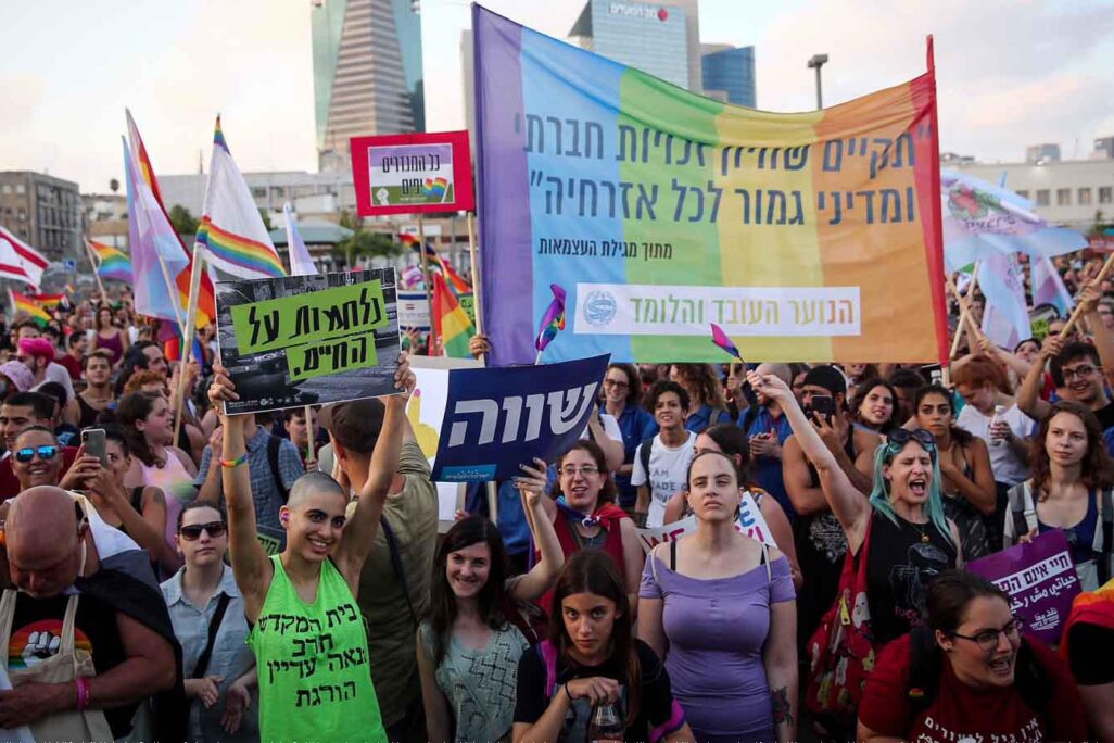 Members of the LGBTQ+ community and supporters participate in a protest march against a Knesset bill amendment denying surrogacy for same-sex couples in 2018. (Photo: Miriam Alster/Flash90)