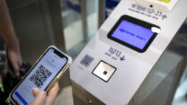 Israelis present their tranport pass at the Jerusalem railway station on April 03, 2022. Photo by Olivier Fitoussi/Flash90