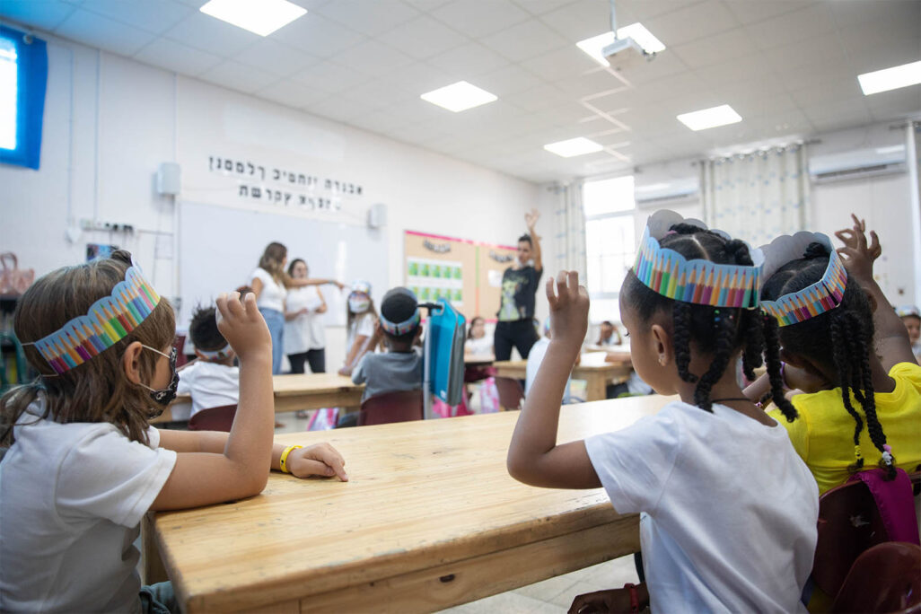 First grade students sit in a classroom on their first day of school, at Tali Geulim school in Jerusalem on September 01, 2020 (Photo: Noam Revkin Fenton/Flash90)