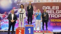 סמברג על הפודיום במשחקי העולם בבלגרד (קרדיט: ההתאחדות הישראלית לטקוואנדו)