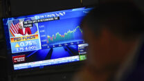 Traders work on the floor at the New York Stock Exchange as the Federal Reserve makes an announcement regarding interest rates in New York, Wednesday, Nov. 2, 2022. (AP Photo/Seth Wenig)