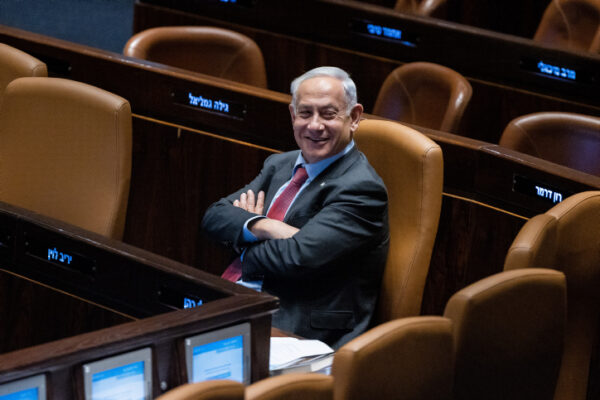 בנימין נתניהו במליאת הכנסת אחרי אישור החוקים (צילום: יונתן זינדל/פלאש 90)