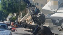 מנוף קרס בתל אביב. זירת התאונה (צילום: דוברות איחוד הצלה)