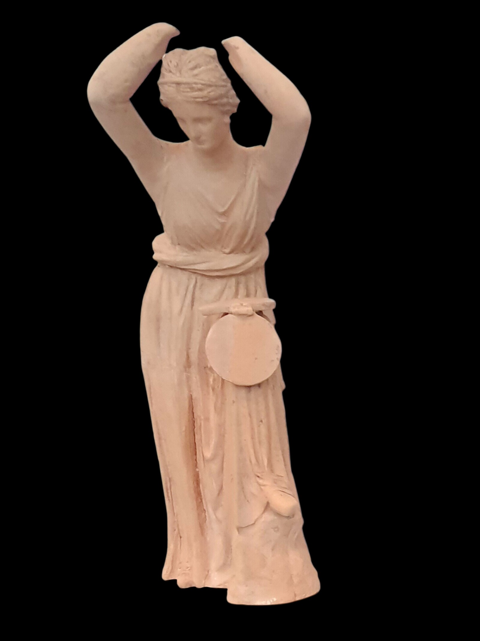 צלמית הלניסטית של אישה המתבוננת במראה מתקפלת. מוצגת במוזיאון המטרופוליטן בניו יורק (צילום: ליאת עוז, רשות העתיקות)