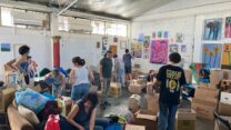 חברי המשמר היהודי-ערבי ביפו אוספים ציוד לסיוע לתושבי הדרום (צילום: אלבום פרטי)