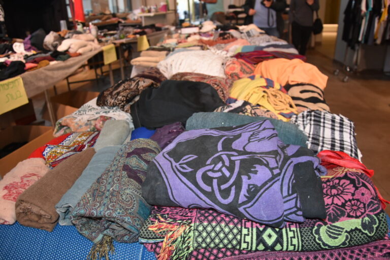 Scarves. The items arrive at the compound after they have been washed and cleaned. (Photo: Hadas Yom Tov)