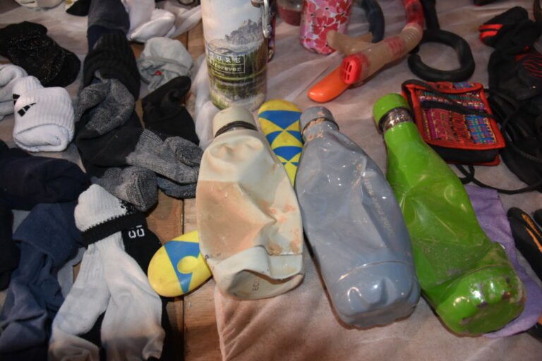 Crushed drink bottles. "Everything here belongs to people. Some of them are alive, some of them are not alive, some of them are kidnapped" (Photo: Hadas Yom Tov