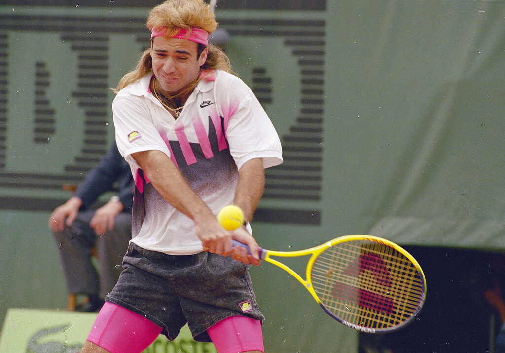שחקן הטניס אנדרה אגאסי בשנת 1990 (צילום: AP)