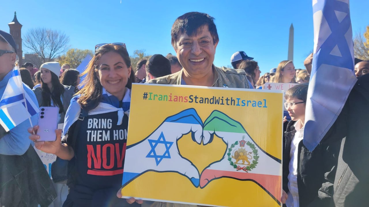 Farnood in a demonstration of solidarity with Israel in Washington DC. &quot;I was excited to see our Lion and Sun flags next to the Israeli flags in the demonstrations&quot; (Photo: Private album)