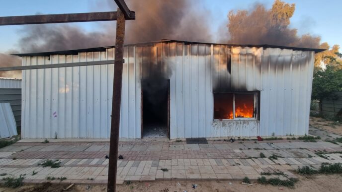 A building set on fire during the demolition of the Abu Issa family compound (Photo: Council of Unrecognized Villages)