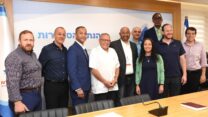 בר-דוד עם נציגי האיגודים מארה"ב (צילום: דוברות ההסתדרות)