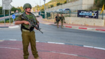 כוחות הביטחון בזירת תקיפת הכטב"ם בחורפיש (צילום: איל מרגולין/פלאש90)