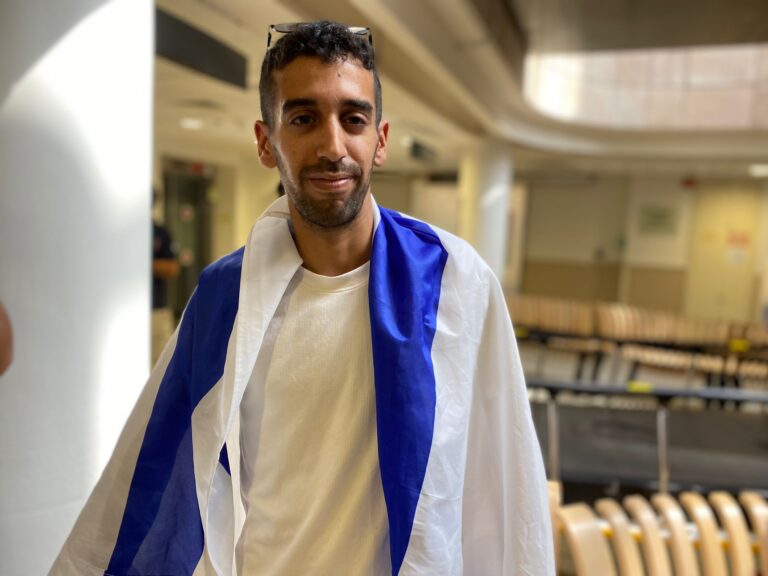Yosef, a resident of Ramat Gan who came to the hospital to celebrate the hostages’ release. (Photo: Yahel Farag)