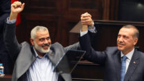 רג'פ טייפ ארדואן ואיסמעיל הנייה (צילום: AP Photo/File)