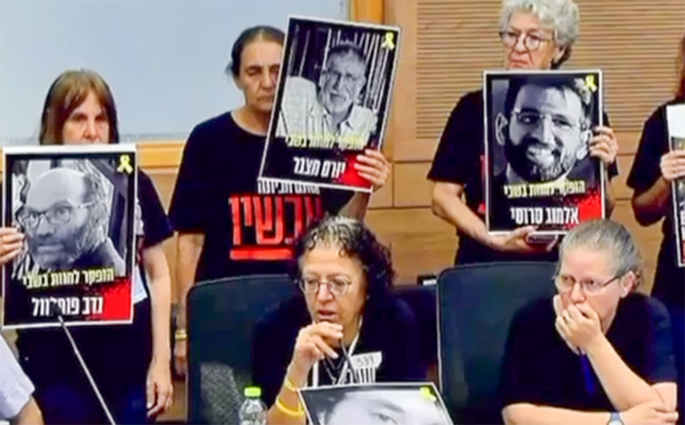 אסתר בוכשטב, אימו של יגב בוכשטב, בכנסת (צילום מסך: ערוץ הכנסת) אסתר בוכשטב, אימו של יגב בוכשטב, בכנסת (צילום מסך: ערוץ הכנסת)