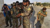 כוחות SDF בסוריה (צילום ארכיון: AP Photo/Hussein Malla, File)