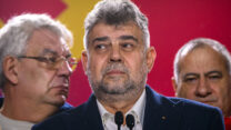 ראש הממשלה מרצ'ל צ'ולאקו (צילום: AP Photo/Alexandru Dobre)