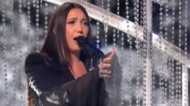 יובל רפאל שרה את השיר 'יום חדש יזרח' בחצי הגמר השני של תחרות האירוויזיון בבאזל (צילום מסך)