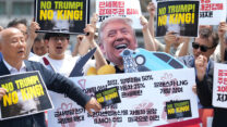 מחאה נגד המכסים של נשיא ארה"ב דונלד טראמפ בקוריאה הדרומית, יוני 2025 (צילום: AP Photo/Lee Jin-man)