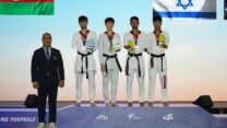 אסף יסעור עם מדליית הארד באליפות הסבב העולמי בטאקוונדו פראלימפי בקוריאה הדרומית.  (צילום: איגוד הטאקוונדו העולמי)