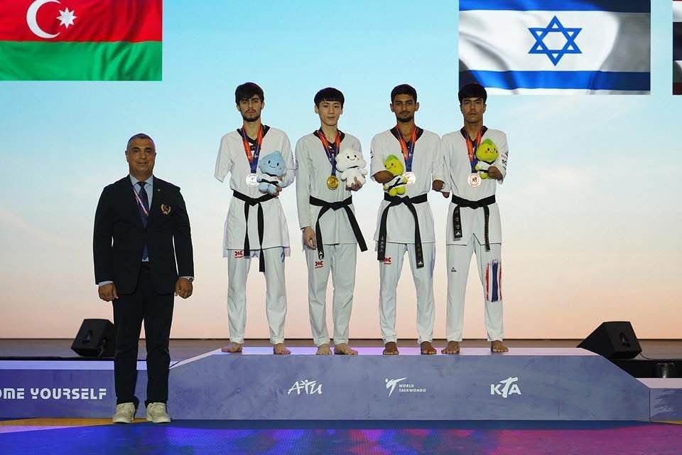 אסף יסעור עם מדליית הארד באליפות הסבב העולמי בטאקוונדו פראלימפי בקוריאה הדרומית. (צילום: איגוד הטאקוונדו העולמי) אסף יסעור עם מדליית הארד באליפות הסבב העולמי בטאקוונדו פראלימפי בקוריאה הדרומית. (צילום: איגוד הטאקוונדו העולמי)