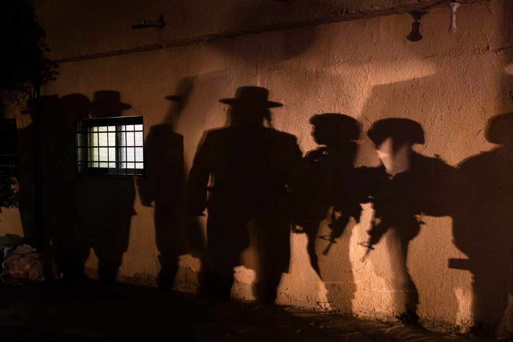 תמונת השנה בתערוכה 'עדות מקומית'. צילום של איתי רון (הארץ) מהכפר כיפל חארת׳ בעת הילולה