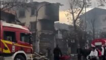 בניין שנפגע בשריפה שהצית המשטר האיראני בעיר ראשת (צילום מסך)