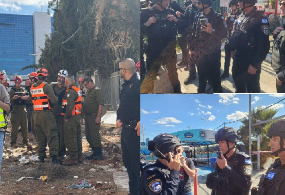 שוטרי מחוז ת"א בסיוע לוחמי מג"ב מטפלים בזירות נפילה של שברי יירוט (צילום: דוברות המשטרה)
