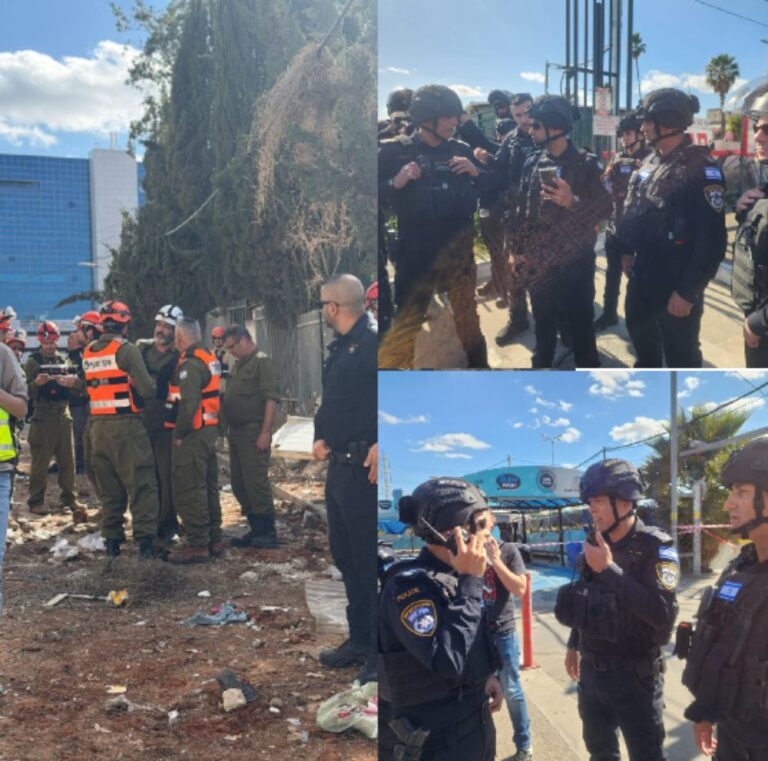 שוטרי מחוז ת"א בסיוע לוחמי מג"ב מטפלים בזירות נפילה של שברי יירוט (צילום: דוברות המשטרה)