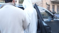 הובלת החשוד בריגול עבור איראן למעצר (צילום מסך מסרטון: דוברות המשטרה)