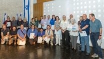 מקבלי אות ההוקרה (צילום: חנוך גריזיצקי)